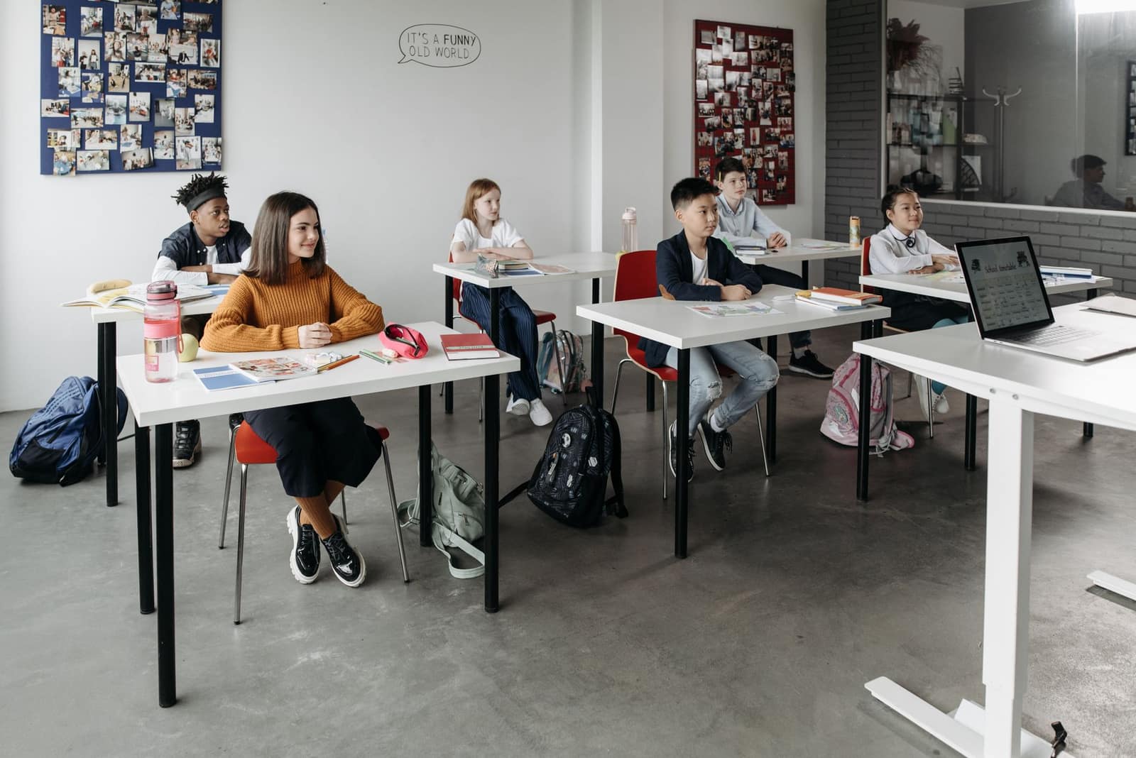 Students learning attentively in a bright classroom setting