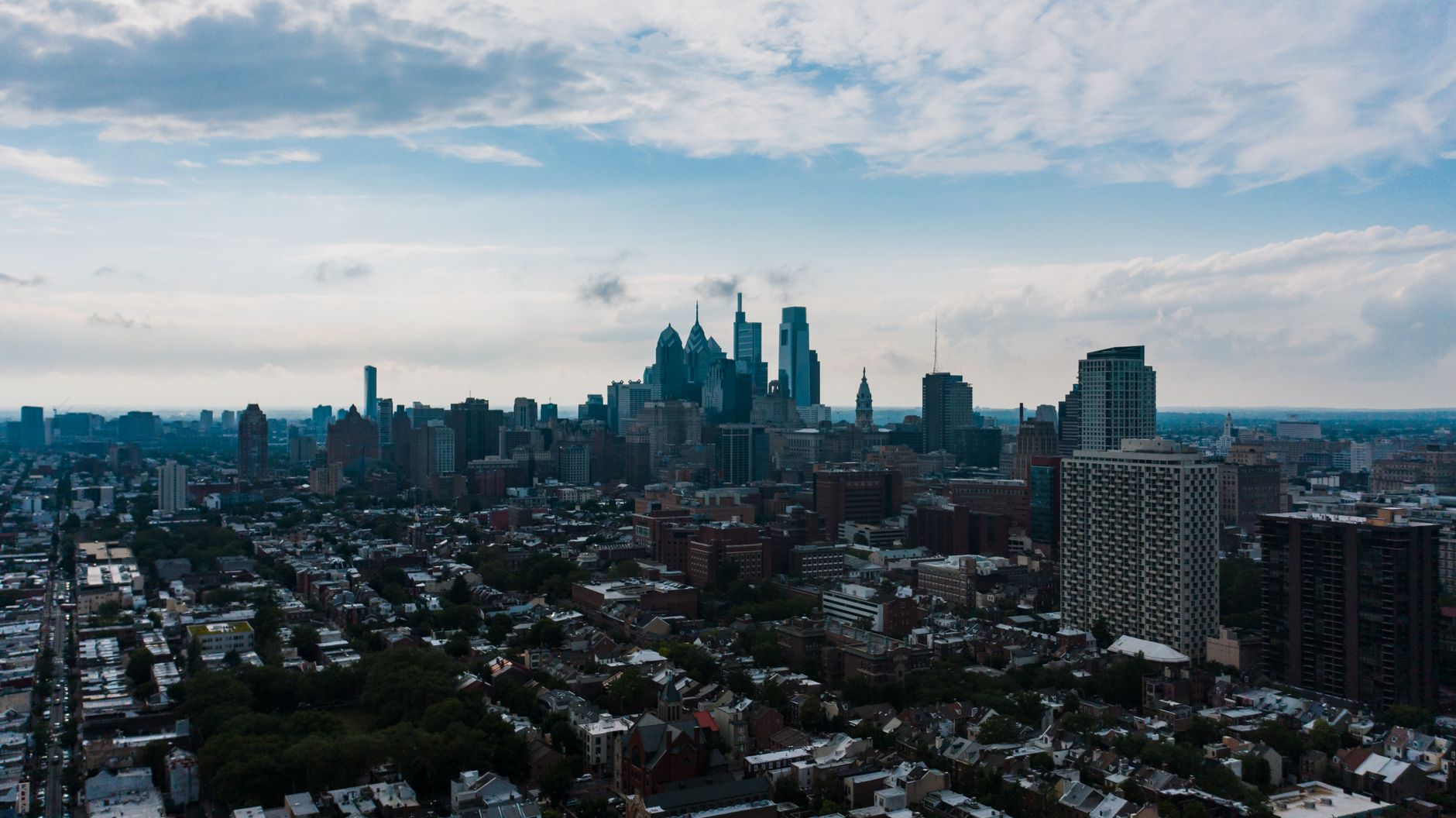 Aerial view of a contemporary apartment complex with high skyscrapers in a metropolitan business district