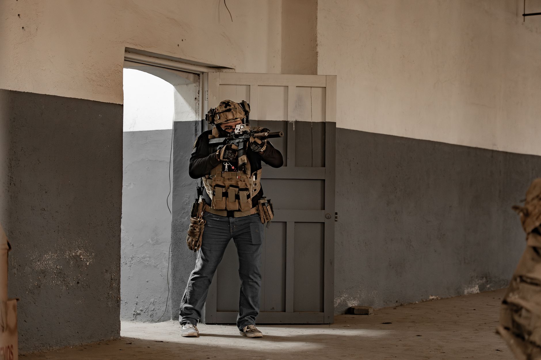Armed security personnel in tactical gear during an operation exercise