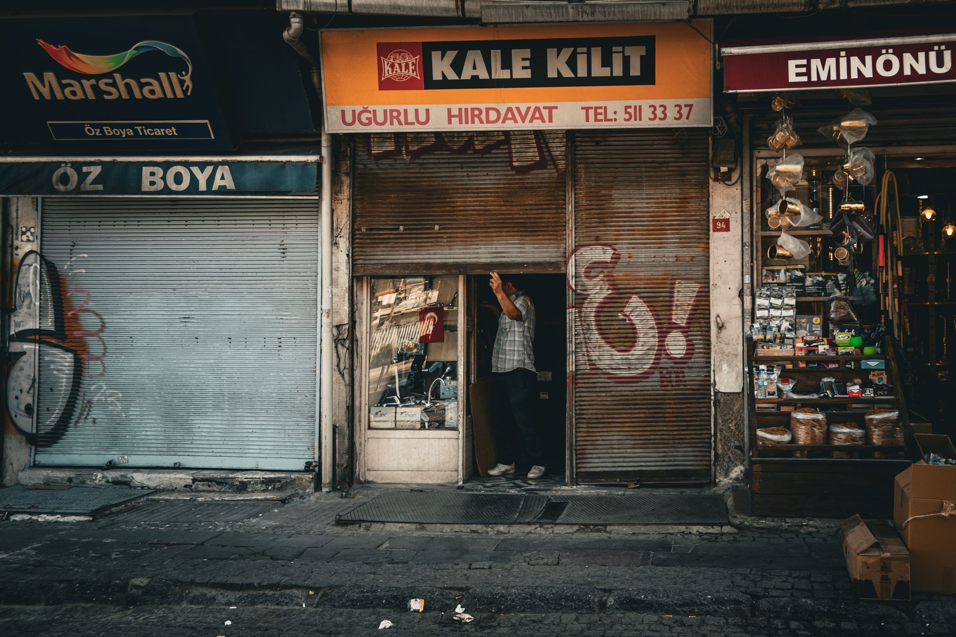 A street lined with small shops and storefronts
