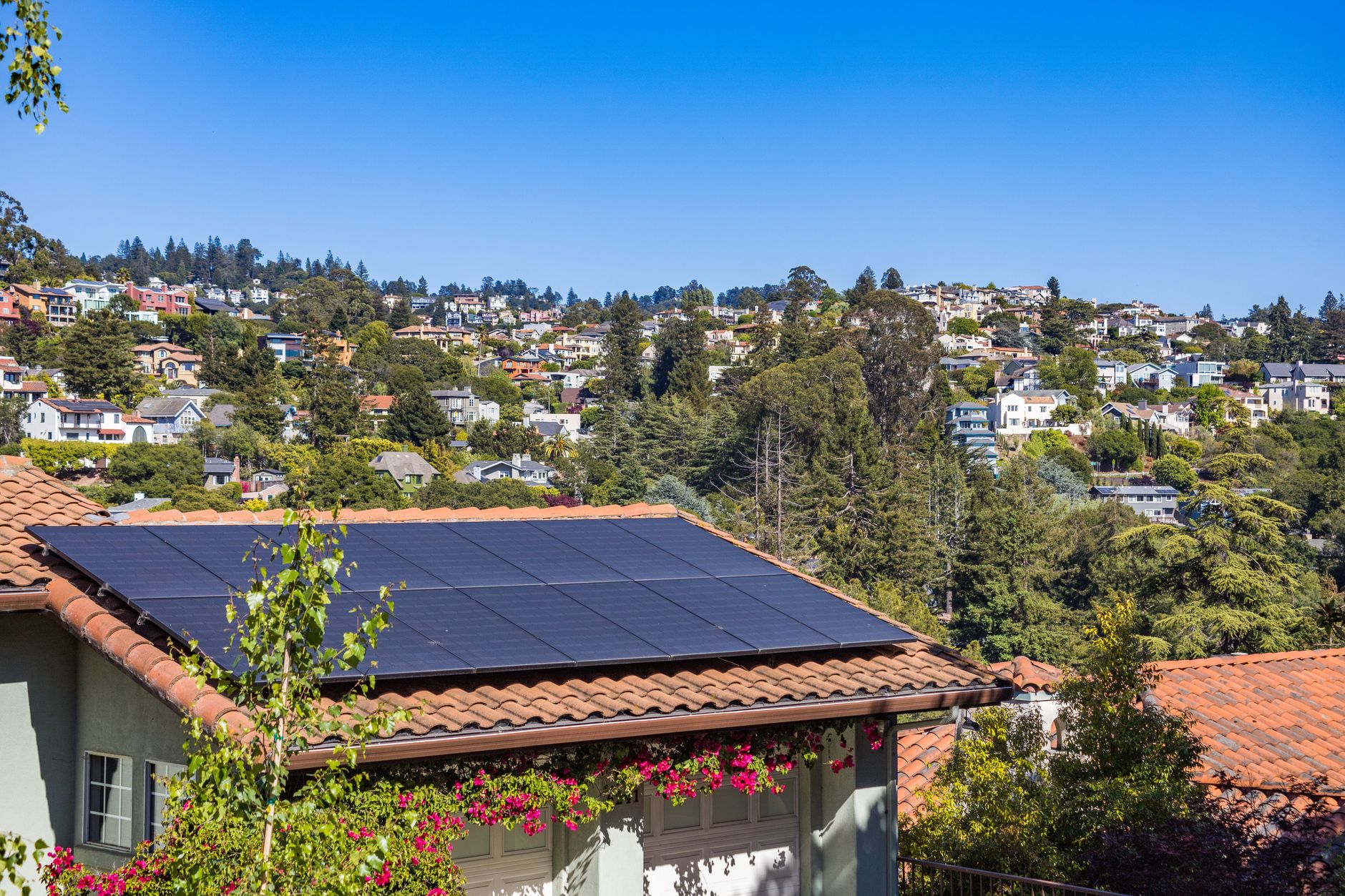 Solar panels installed on the roof of a suburban home